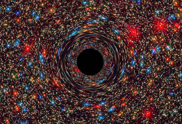 Rappresentazione artistica di un gigantesco buco nero al centro di una galassia (fonte: NASA, ESA, and D. Coe, J. Anderson, and R. van der Marel, STScI)